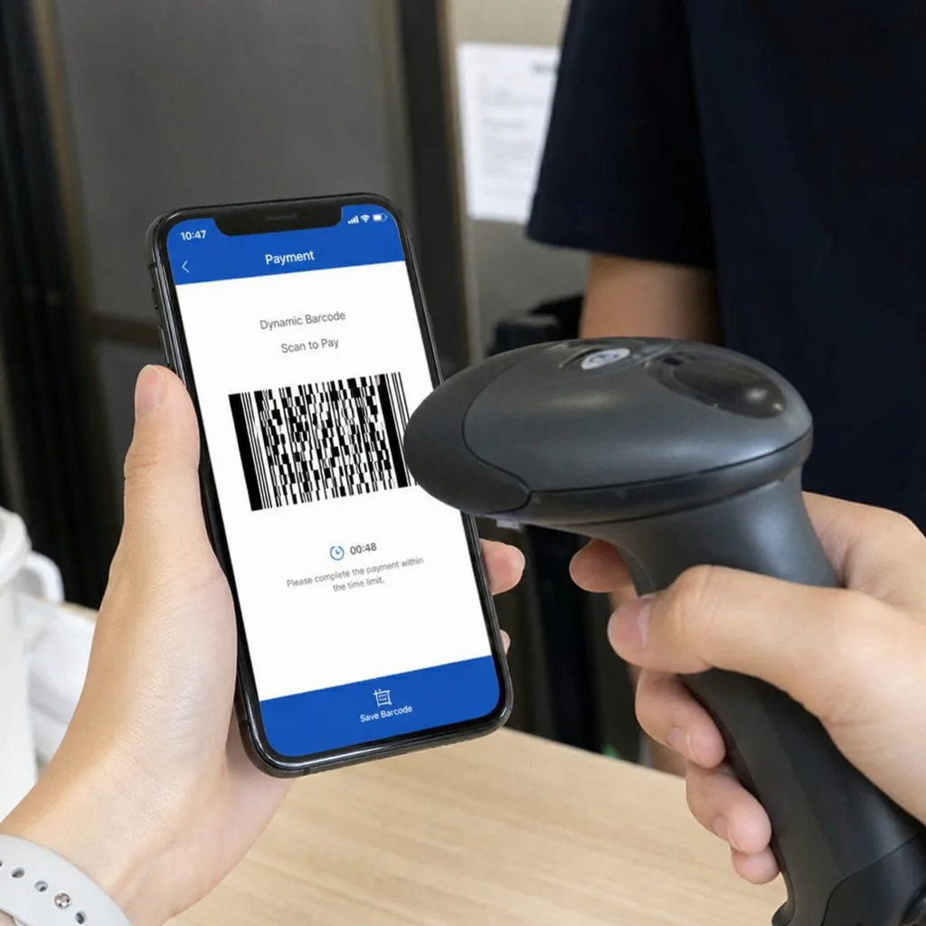 A QR ticket being validated by a handheld scanner