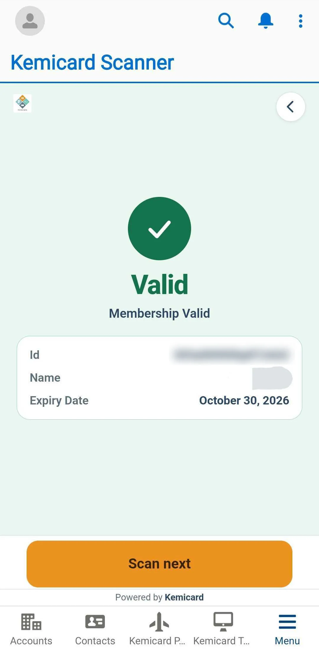 A green Valid check-in result on a phone showing the member's ID, name and expiry date